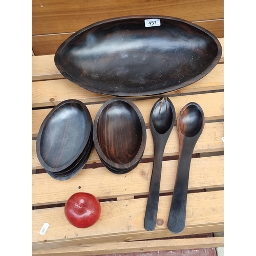 457 - A stylish collection of ten pieces of sleek hand made serving ware. Crafted from a gorgeous tropical... 