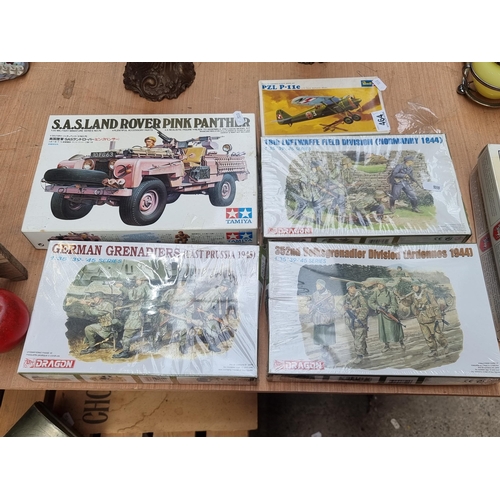 464 - A charming collection of five vintage boxed military model kits (all unassembled). Including a Tamiy... 