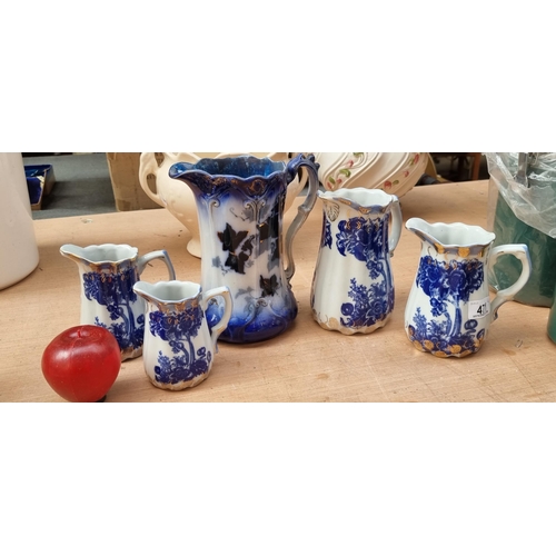 471 - Four stunning graduated antique Victoria Ironstone ceramic pitchers. Each piece is a wonderful examp... 