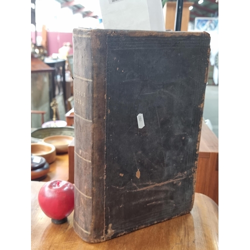 664 - Star Lot : A phenomenal, very large antique hardback book titled 