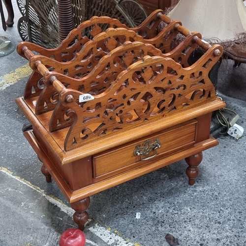 680 - A beautiful vintage honey mahogany  canterbury with three compartments to top separated by pierced w... 