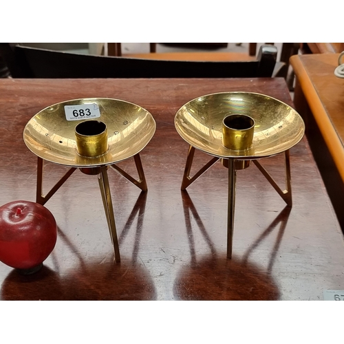 683 - Two super mid century church candle holders held on three triangular legs with wide drip trays. Good... 