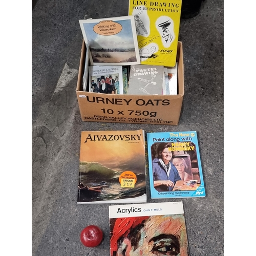 687 - A box filled with vintage art books and periodicals including 