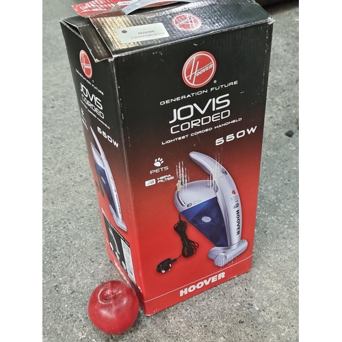 688 - A Jovis Corded handheld vacuum made by Hoover, in original box. With three pronged plug.