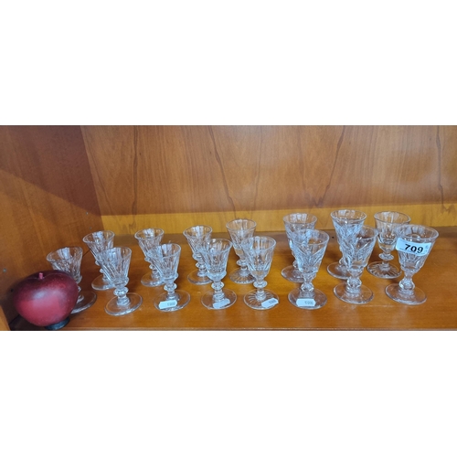 709 - 18 pieces of cut crystal  glasses in good condition.