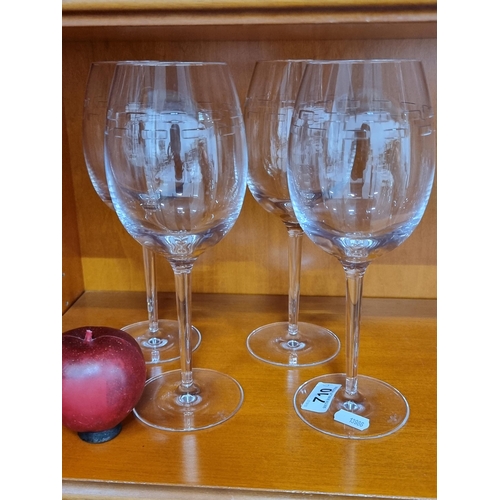 710 - Four large John Roche by Waterford Crystal wine glasses with nice etched design to top. On line for ... 