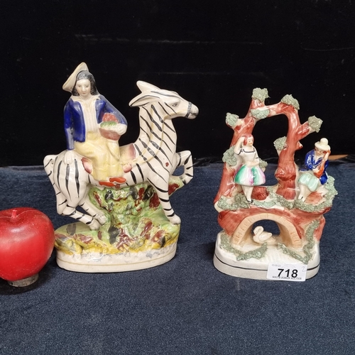 718 - Two original early 19th century  Staffordshire ceramic flatbacks including a couple playing music on... 