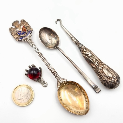 12 - Four items, consisting of three silver examples which include two spoons and a silver handled boot h... 