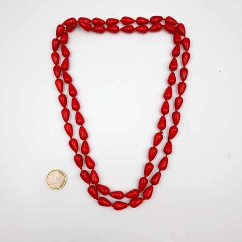 49 - A fine and generous natural Mediterranean Red Coral beaded necklace. Stones cold to touch. Length: 1... 