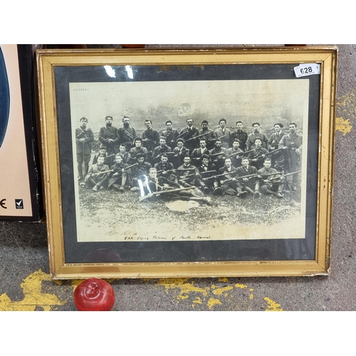 628 - A vintage newspaper print of a photograph depicting the IRA flying column the Men of the West, The w... 