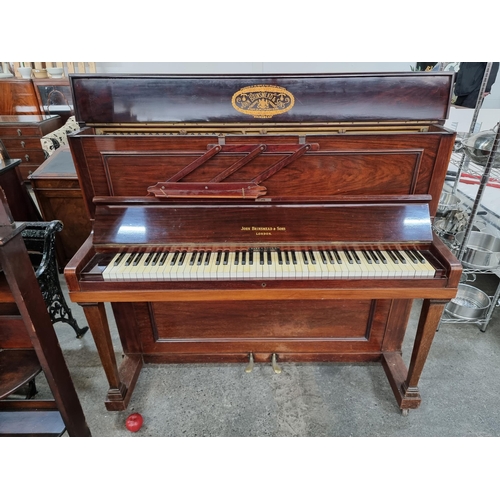 856 - A gorgeous antique early 20th century upright piano by John Brinsmead & Sons complete with two pedal... 