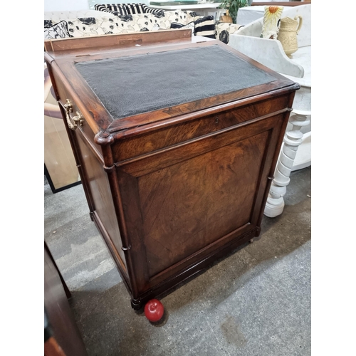 861 - Star Lot : A gorgeous 1820s Rosewood  davenport desk with sloped writing surface topped with black l... 