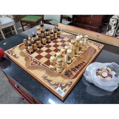 862 - Star Lot : A beautiful hand carved wooden chess set with parquetry board and all pieces with hand pa... 