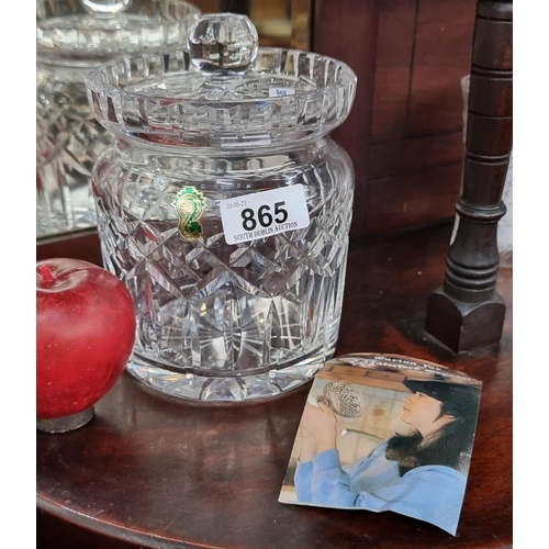 865 - A large and heavy Waterford crystal lidded biscuit jar in the Lismore pattern. As new condition.