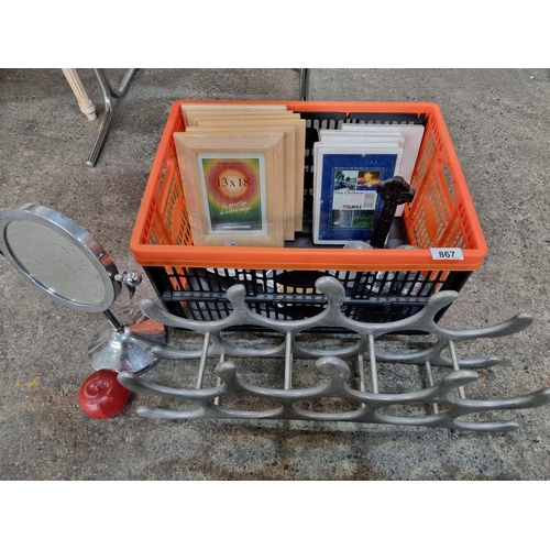 867 - A mixed homeware lot including 6 brand new wooden picture frames, a modern looking chrome wine rack ... 