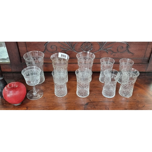 869 - 10 delicate early 1820s cut crystal glasses  with etched swag pattern to each rim. Lovely quality at... 