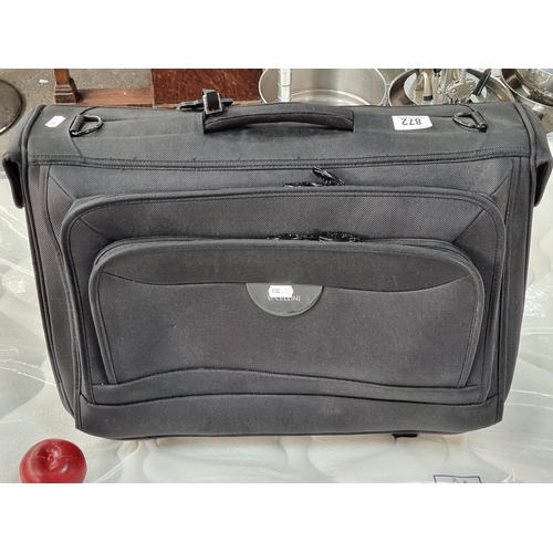 872 - A good quality Cellini overnight suitcase with huge storage inside, including front pockets for toil... 