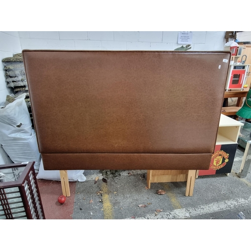 886 - A very high quality, large contemporary brown leather headboard. H: 134cm (including placement stake... 