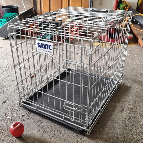 910 - A large pet metal crate from Savic. With a removable plastic tray to base and hinged door. Collapsib... 