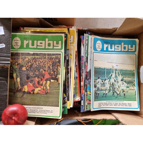 934 - A box filled with vintage rugby magazines including 