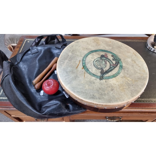 950 - A brilliant vintage Bodhran drum with stretched calf leather head on a wooden frame with celtic orna... 