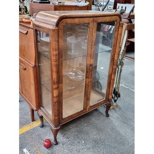 663 - Star lot : A stunning 1920's Art Deco glazed walnut display cabinet, with wonderful rounded corners,... 