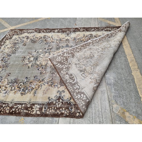 880 - Star Lot : A nice large, Vintage  hand made Handnotted Turkish wool on Cotton rug in shades of fawn,... 