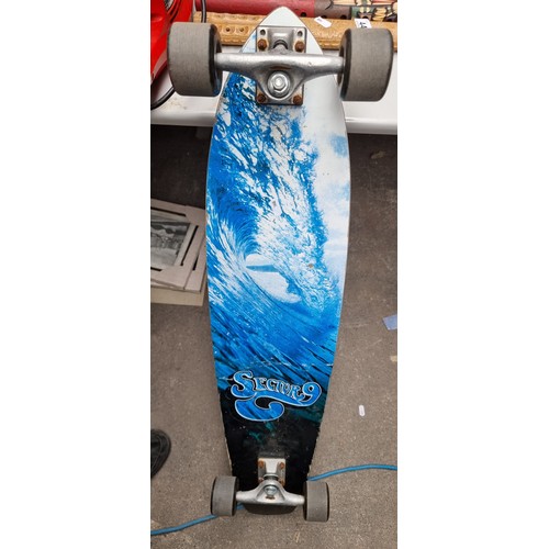 441 - A Sector 9 longboard with a griptape top and an ocean wave design to base. With Sector Nine 85mm rub... 