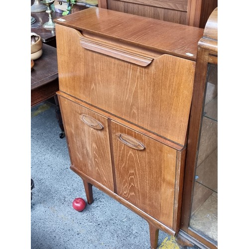 662 - Star lot : A remarkable mid-century modern teak writing bureau. This wonderful piece of furniture bo... 