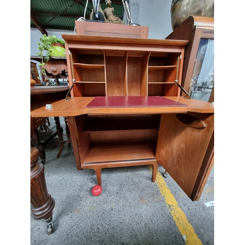 662 - Star lot : A remarkable mid-century modern teak writing bureau. This wonderful piece of furniture bo... 