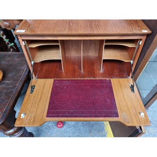 662 - Star lot : A remarkable mid-century modern teak writing bureau. This wonderful piece of furniture bo... 