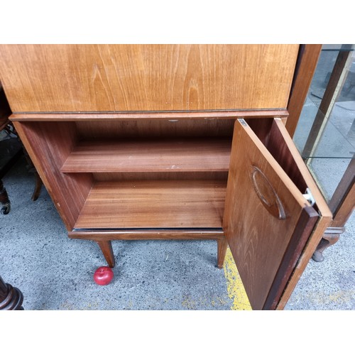 662 - Star lot : A remarkable mid-century modern teak writing bureau. This wonderful piece of furniture bo... 