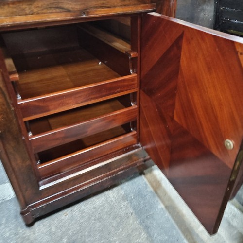 861 - Star Lot : A gorgeous 1820s Rosewood  davenport desk with sloped writing surface topped with black l... 