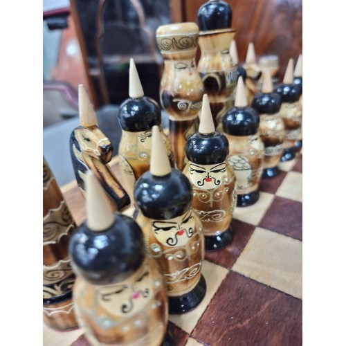 862 - Star Lot : A beautiful hand carved wooden chess set with parquetry board and all pieces with hand pa... 