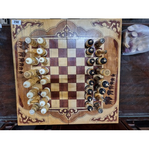 862 - Star Lot : A beautiful hand carved wooden chess set with parquetry board and all pieces with hand pa... 