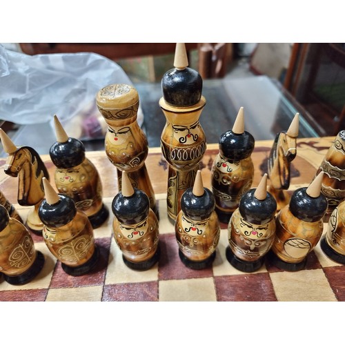 862 - Star Lot : A beautiful hand carved wooden chess set with parquetry board and all pieces with hand pa... 