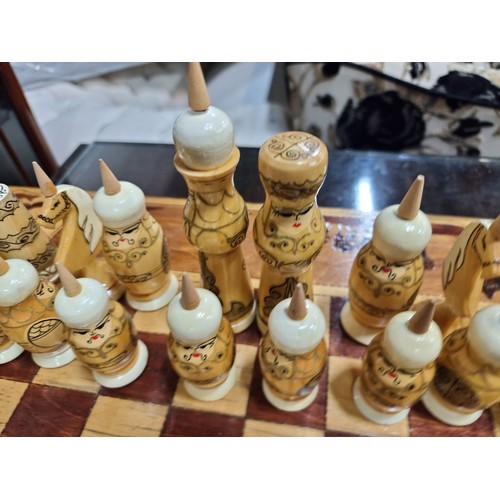 862 - Star Lot : A beautiful hand carved wooden chess set with parquetry board and all pieces with hand pa... 