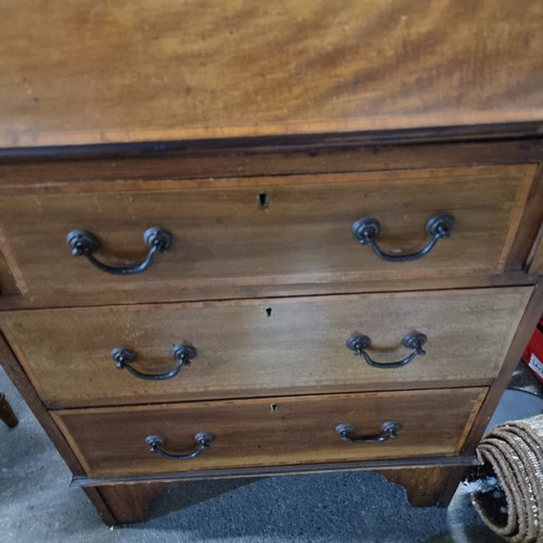 917 - Star Lot : A wonderful Edwardian honey mahogany secretary desk with a drop down table top placed on ... 