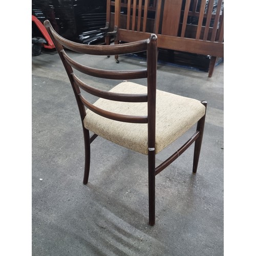 450 - A set of four fabulous Mid Century Modern Danish dining chairs with rosewood frames, delicate curved... 