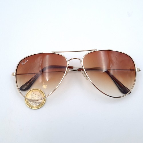 1 - An iconic pair of genuine aviator style beige toned Ray-Ban's. Stamped made in Italy. Lenses in exce... 