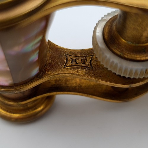 16 - A truly beautiful pair of antique Opera glasses, by the acclaimed jewellers Asprey of London. These ... 