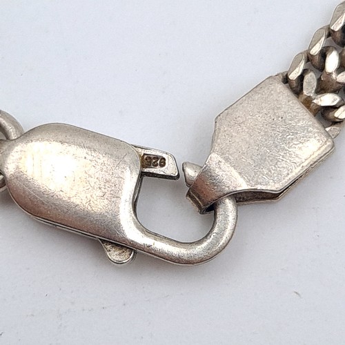 22 - Two sterling silver items, comprising of a heavy gauge sterling silver link chain and a rope twist c... 