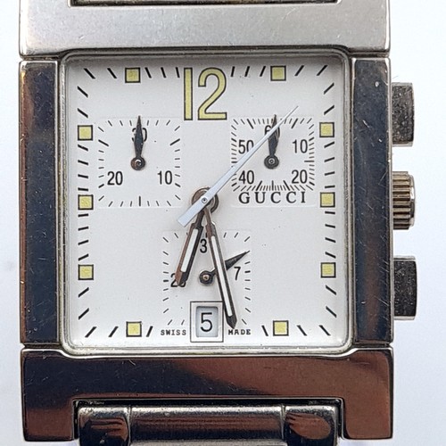25 - Star Lot : A genuine Gucci 7700 series tank style metal chronograph wrist watch, marked Swiss made a... 