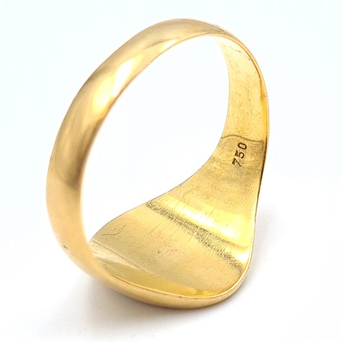 30 - Star Lot: A fine example of a heavy 18 carat gold marked gents signet ring, set with foliate and ini... 