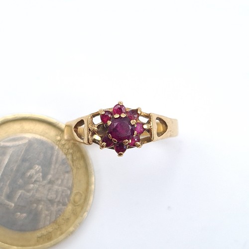 32 - Star Lot: An exquisite 9 carat gold Ruby cluster ring, set with floral clawed mount. Ring size: L. W... 