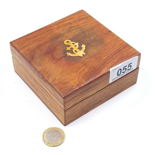 55 - A good brass compass with a built in sundial, set in wooden presentation box which features nautical... 