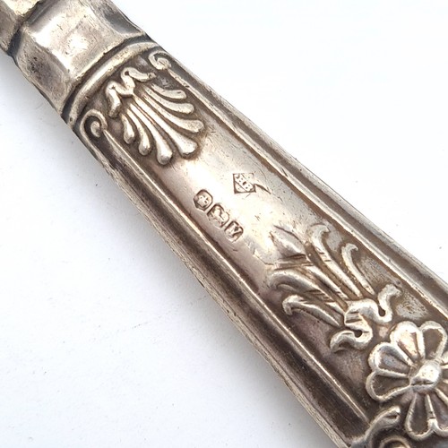 56 - A fine example of a sterling silver handled cake knife, featuring a stunning profuse foliate body. H... 