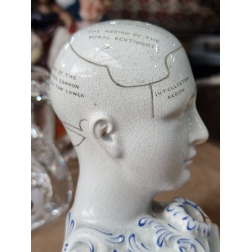 106 - A ceramic 19th century Phrenology bust pen-stand. This charming example features a phrenology bust w... 