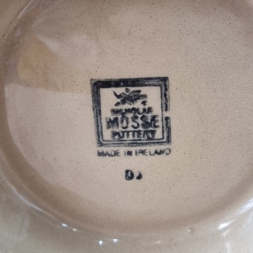 115 - A large Nicholas Mosse studio pottery bowl in the Old Rose spongeware pattern. D27cm. A shallow bowl... 