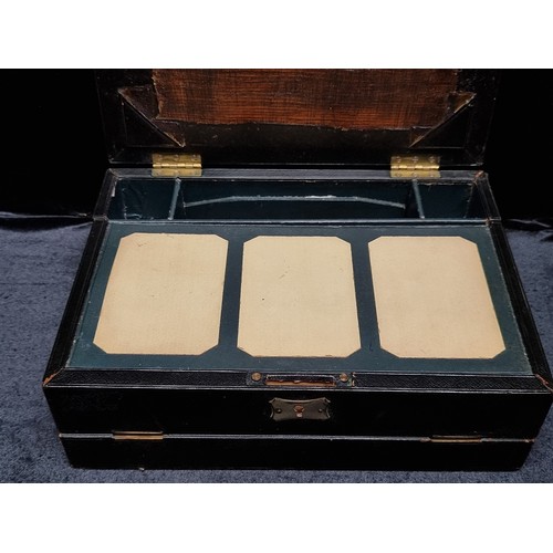 228 - A very handsome antique leather bound stationary box, with a myriad of internal compartments and met... 